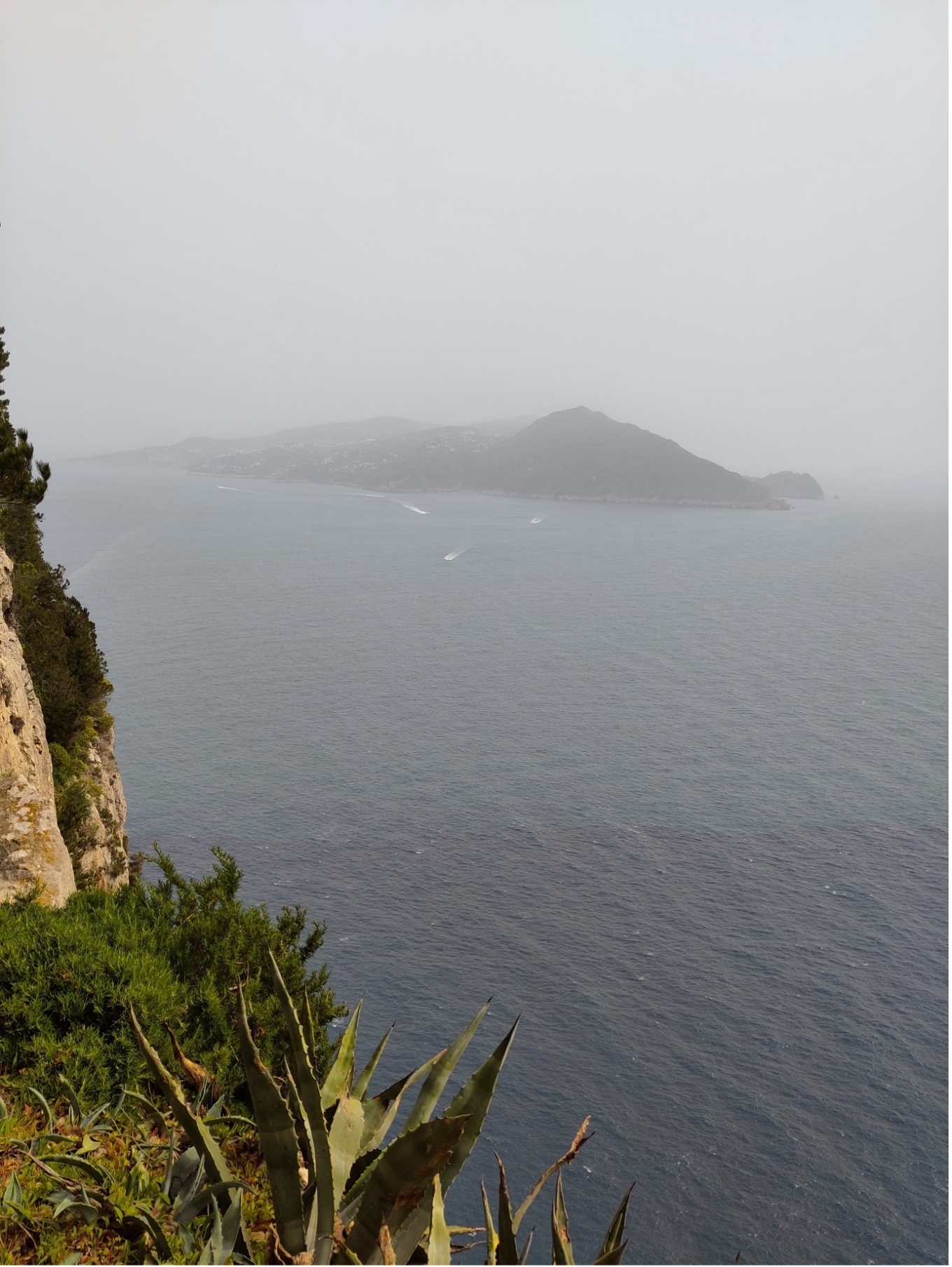 Dust storm over southern Italy, March 2024: view from Capri towards the Sorrento Peninsula, barely 5pm away